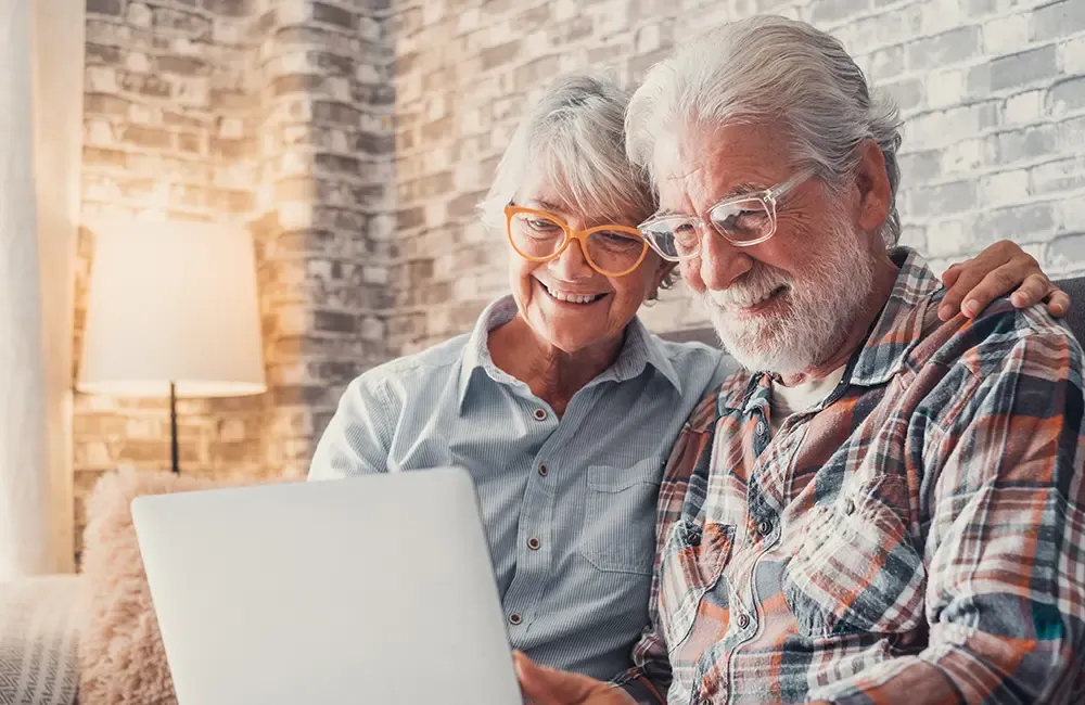 Two adults reviewing information together